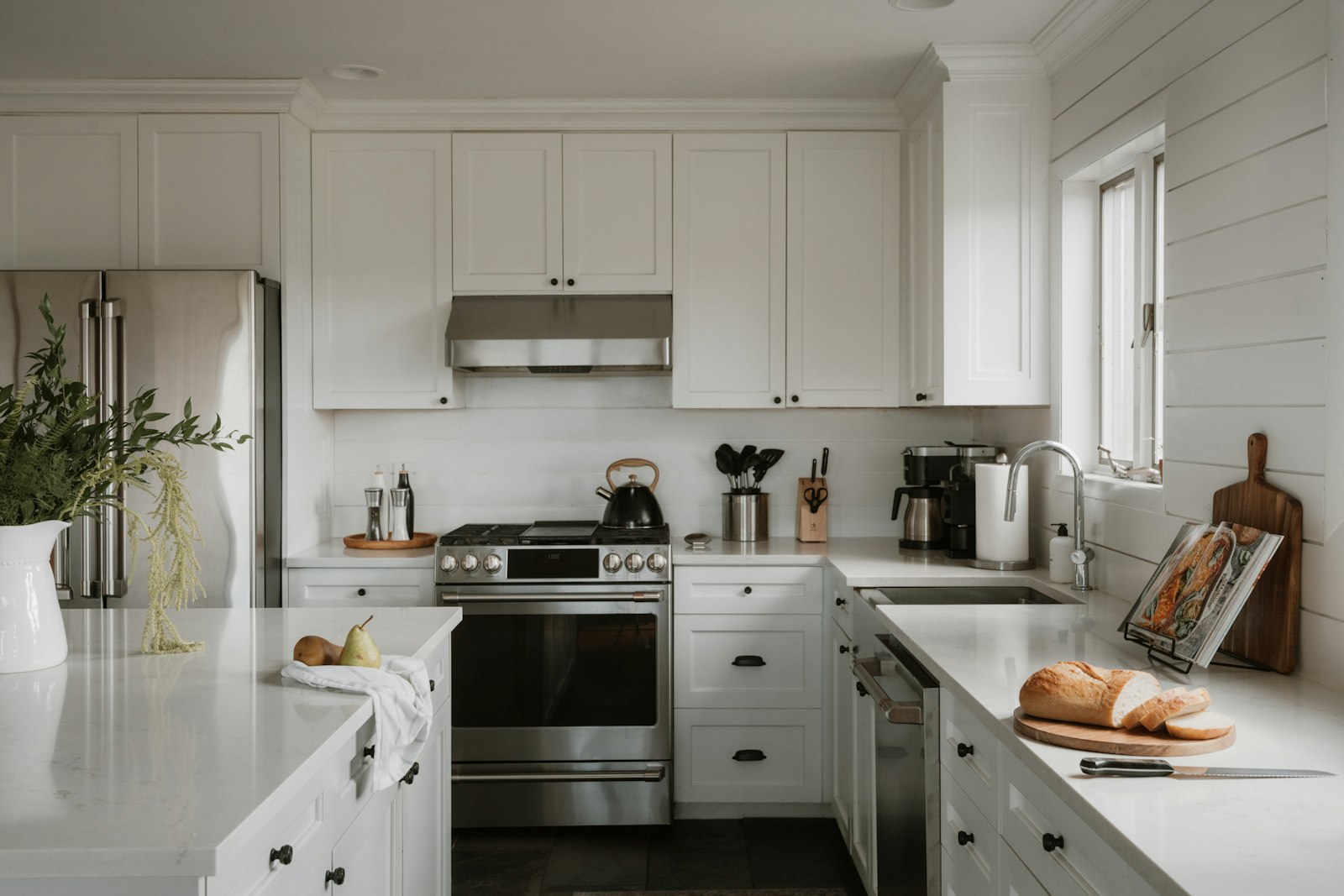 A bright white kitchen, clean and ready to use